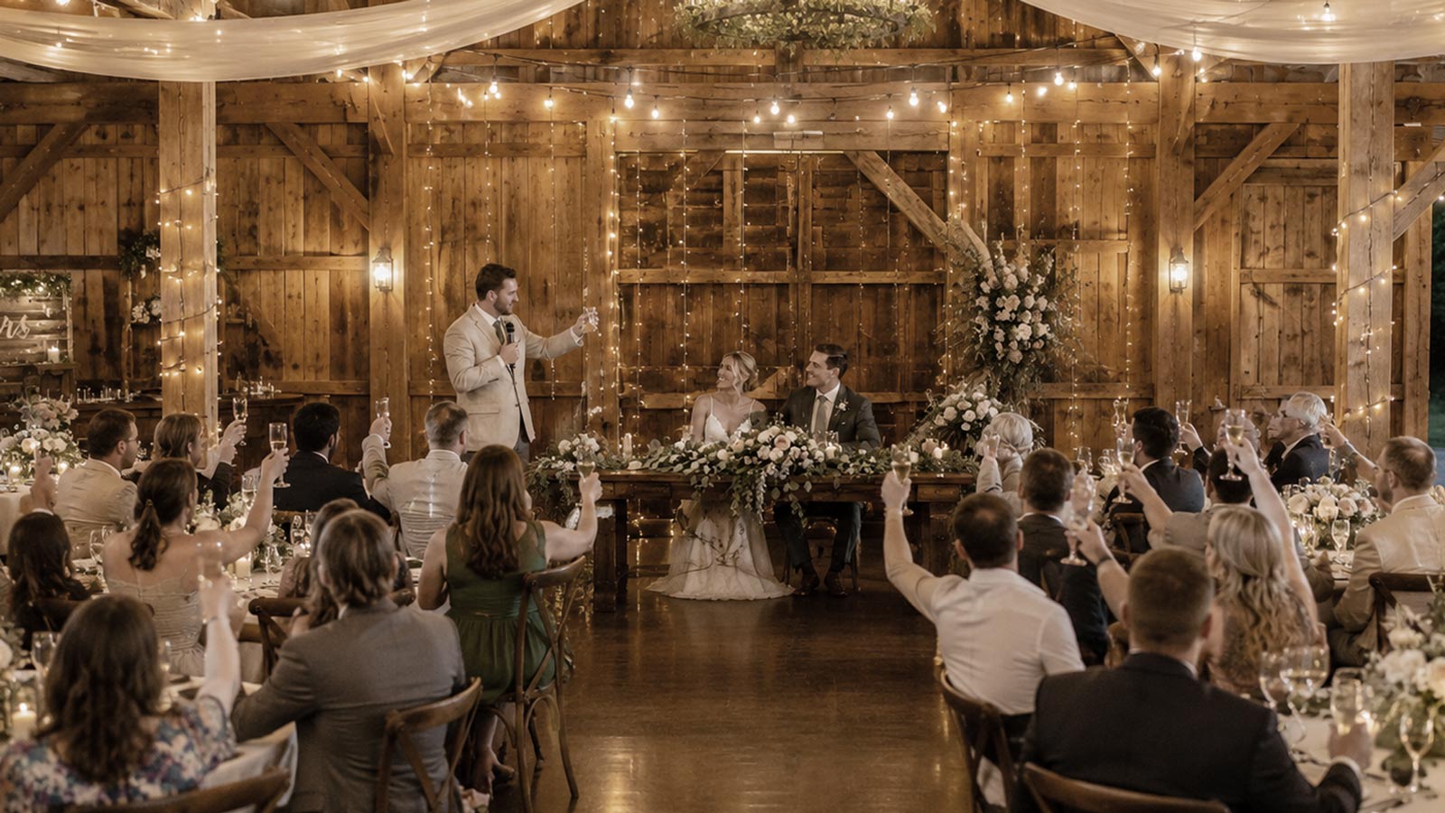 A beautifully lit barn wedding venue interior